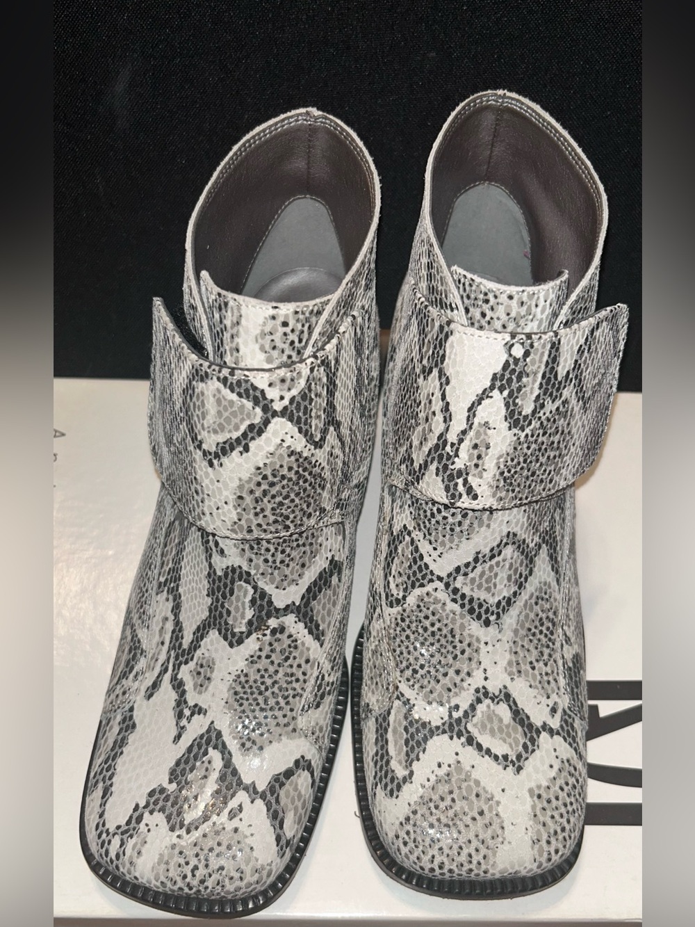 Women’s Snake-Print Ankle Boots in Black and White